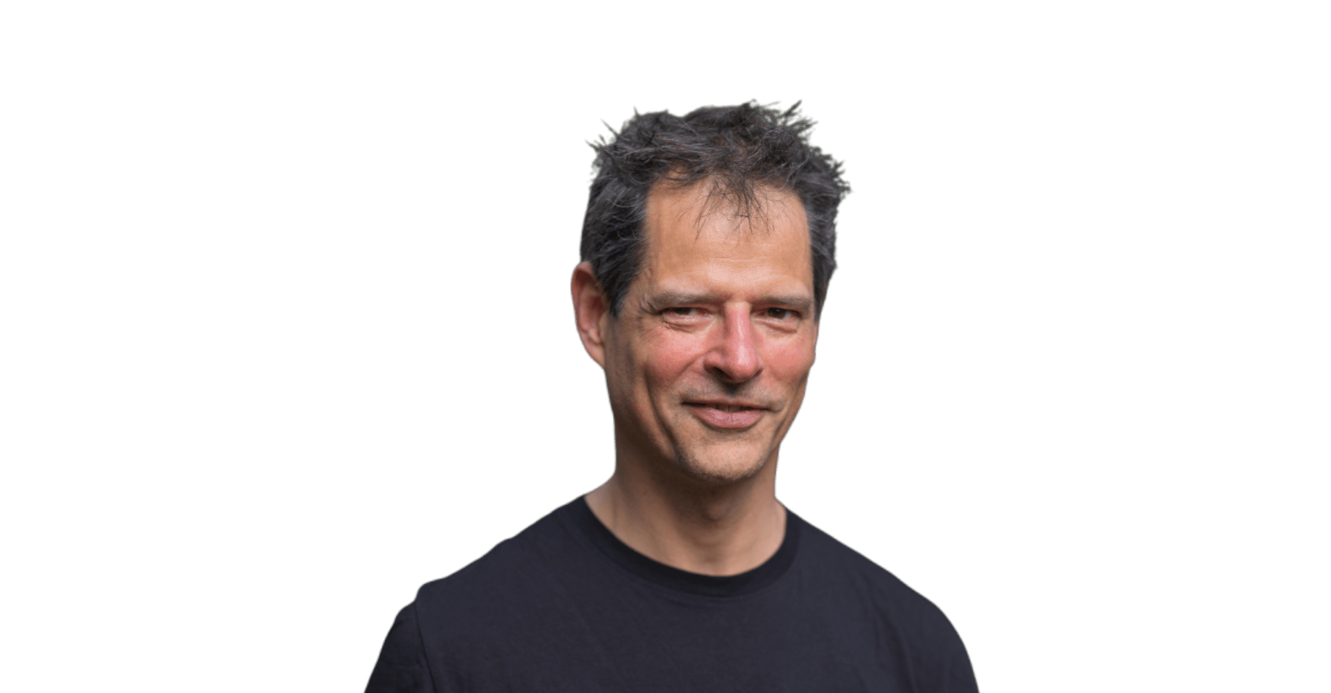 Iwan Koenderman kijkt schuin naar rechts, professioneel portret.